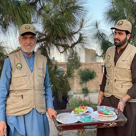 working together at a Ramzan Dastarkhwan